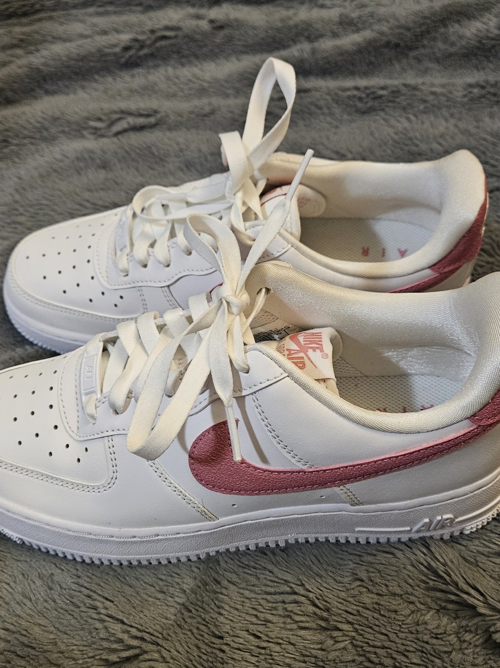 Nike Women's White Sneakers with Pink Swoosh